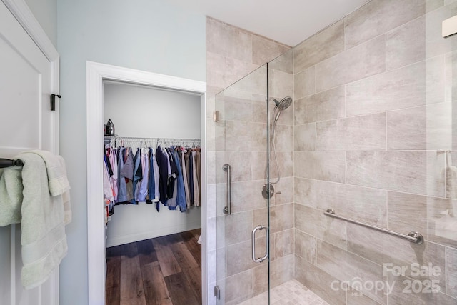 122A Deer Brook Dr Unit A, Shelby, NC 28150 - bathroom featuring a shower stall, wood finished floors, and a walk in closet