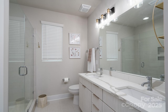 full bath with tile patterned flooring, baseboards, toilet, and a shower stall