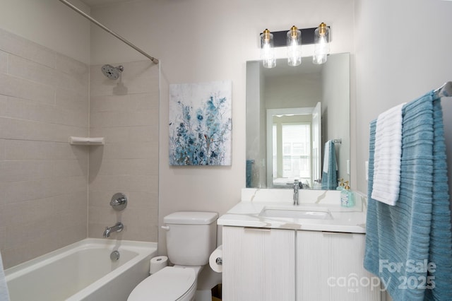 full bath with toilet, shower / bathtub combination, and vanity