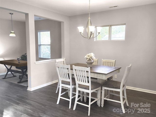4975 Looking Glass Trl, Denver, NC 28037 - dining space with plenty of natural light, baseboards, wood finished floors, and a chandelier
