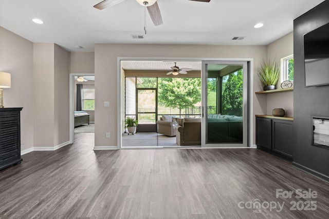 4975 Looking Glass Trl, Denver, NC 28037 - unfurnished living room with a ceiling fan, wood finished floors, plenty of natural light, and recessed lighting
