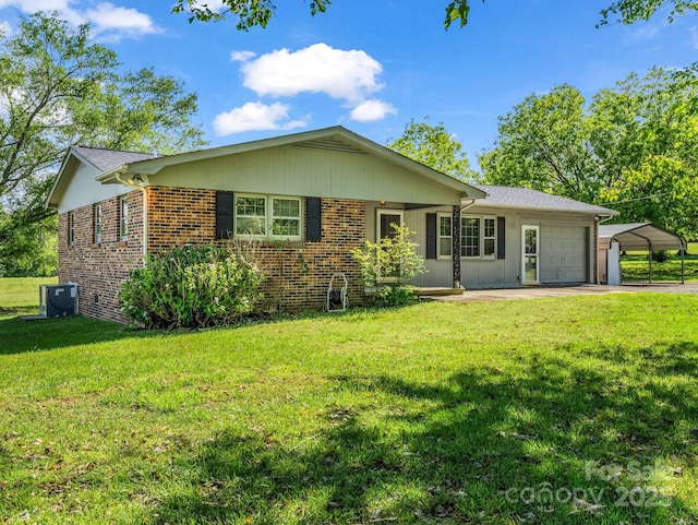 646 Terry Rd, Ellenboro, NC 28040 - ranch-style house featuring a front yard, an attached garage, brick siding, central AC, and driveway