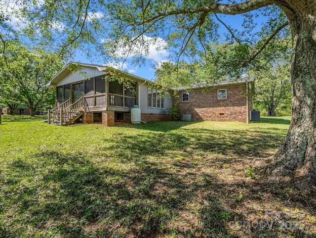 646 Terry Rd, Ellenboro, NC 28040 - rear view of property featuring a sunroom, crawl space, a yard, and brick siding