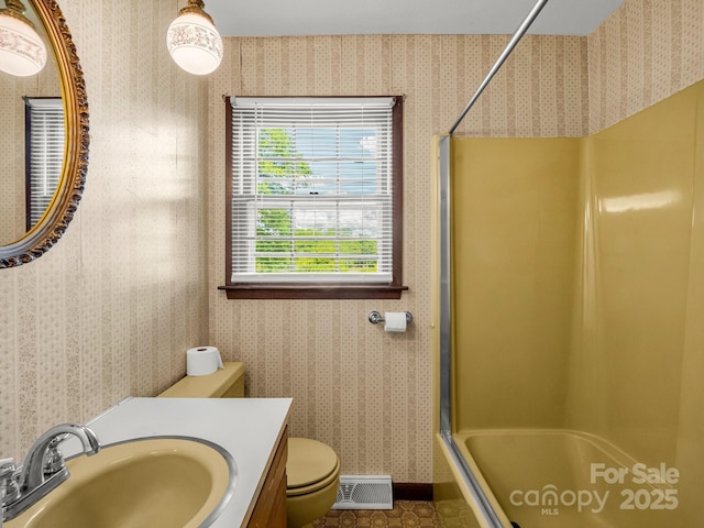 646 Terry Rd, Ellenboro, NC 28040 - full bathroom with toilet, shower / tub combination, vanity, wallpapered walls, and tile patterned floors
