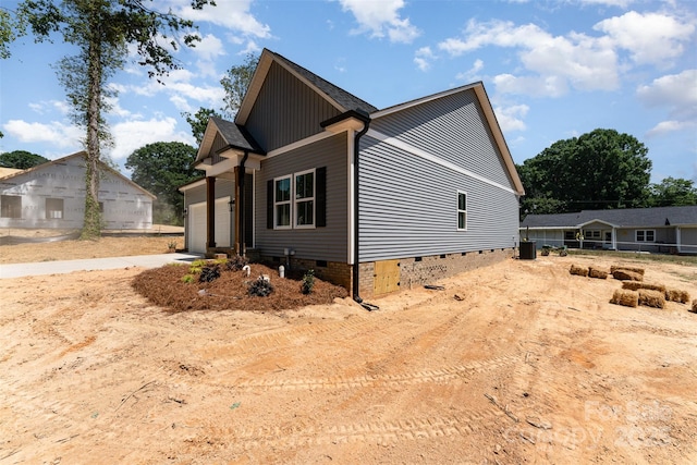 309 Walker St, Kannapolis, NC 28081 - view of side of home featuring crawl space, concrete driveway, and a garage