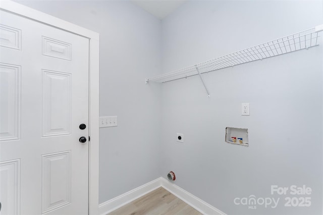 309 Walker St, Kannapolis, NC 28081 - washroom featuring hookup for a washing machine, hookup for an electric dryer, and light wood-style floors