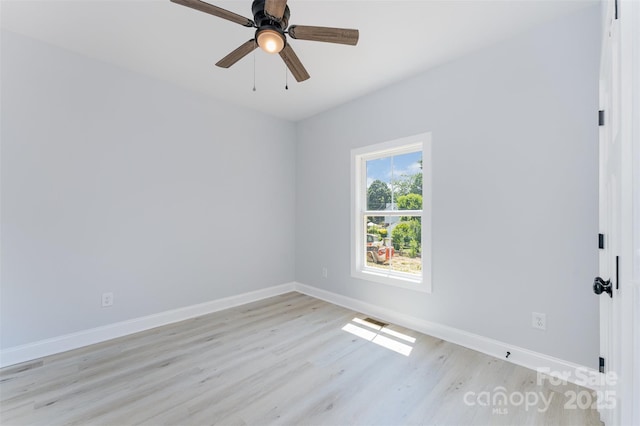 309 Walker St, Kannapolis, NC 28081 - unfurnished room featuring light wood finished floors and ceiling fan
