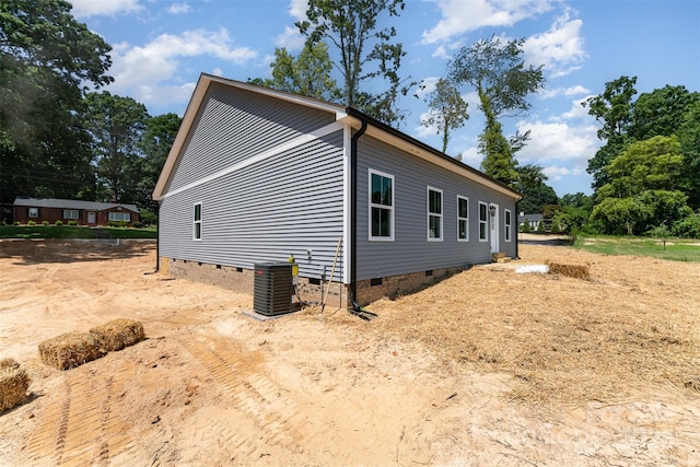309 Walker St, Kannapolis, NC 28081 - view of side of home with crawl space and a central AC unit