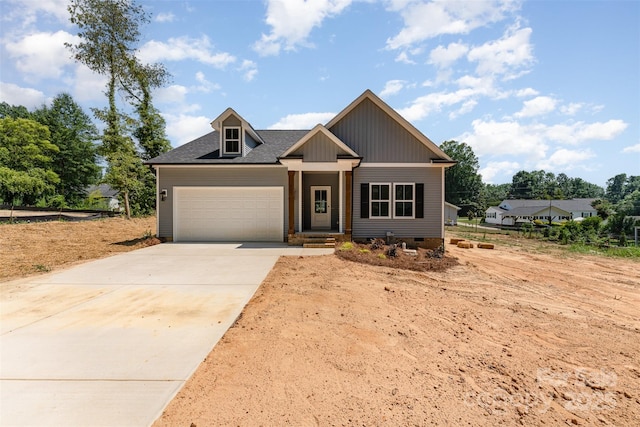 309 Walker St, Kannapolis, NC 28081 - view of front of house with concrete driveway, an attached garage, crawl space, and a shingled roof