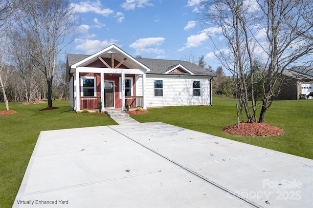 view of front facade with a front lawn and a porch