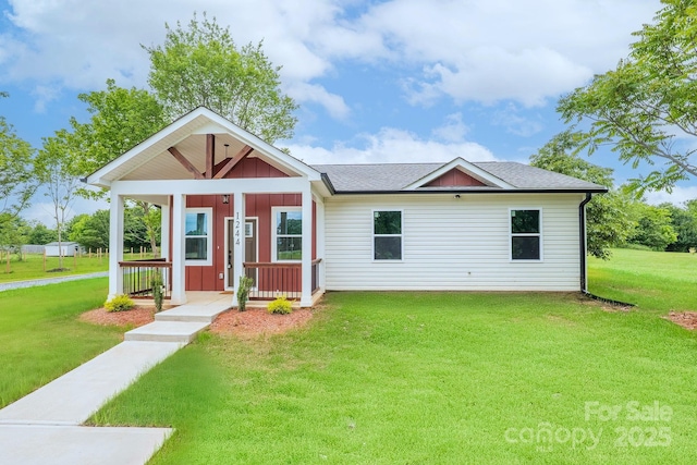 1244 Bob Falls Rd, Shelby, NC 28150 - view of front of home featuring board and batten siding, a porch, a front yard, and a shingled roof