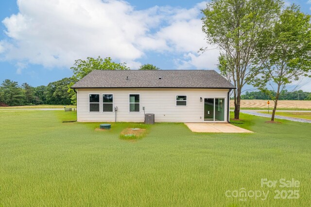 1244 Bob Falls Rd, Shelby, NC 28150 - rear view of property featuring a patio area, a lawn, cooling unit, and roof with shingles