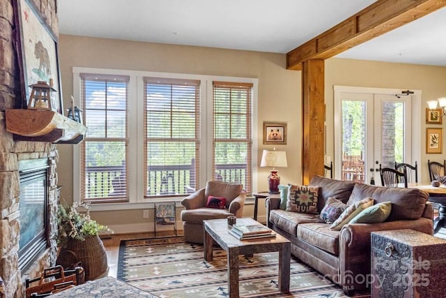 85 Southshore Dr Unit A2, Tuckasegee, NC 28783 - living room featuring a fireplace, plenty of natural light, and baseboards