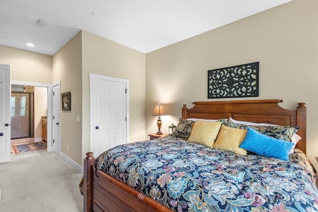 85 Southshore Dr Unit A2, Tuckasegee, NC 28783 - carpeted bedroom with baseboards and connected bathroom