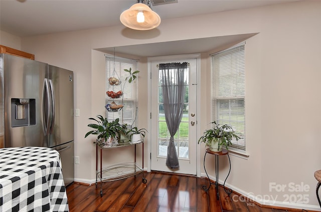 7007 Broad Leaf Ct, Indian Trail, NC 28079 - entryway with dark wood-style flooring and baseboards
