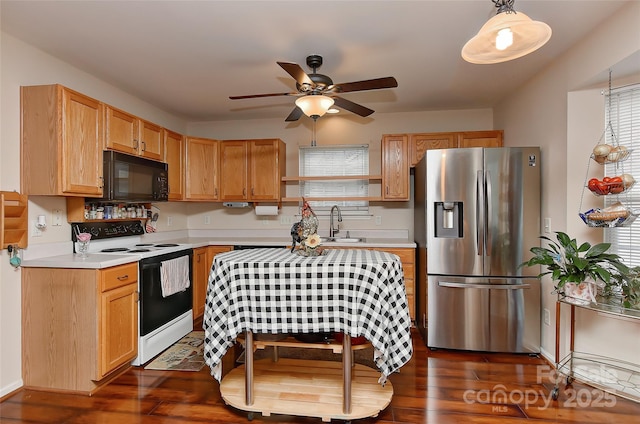 7007 Broad Leaf Ct, Indian Trail, NC 28079 - kitchen featuring stainless steel fridge with ice dispenser, range with electric cooktop, black microwave, and plenty of natural light
