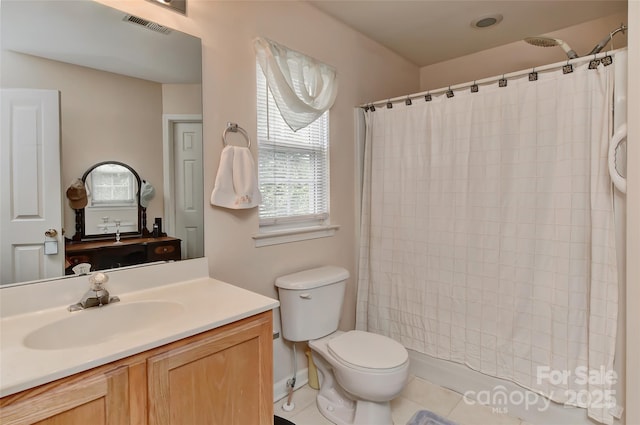7007 Broad Leaf Ct, Indian Trail, NC 28079 - full bath featuring a shower with curtain, toilet, vanity, and tile patterned flooring