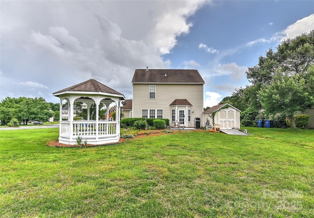 7007 Broad Leaf Ct, Indian Trail, NC 28079 - back of property featuring a gazebo, a storage shed, an outbuilding, and a yard