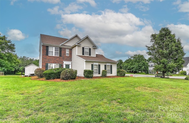 7007 Broad Leaf Ct, Indian Trail, NC 28079 - traditional home featuring a front yard, roof with shingles, and brick siding