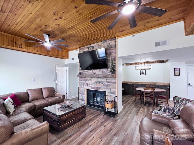 303 Sugar Top Dr Unit 2115, Sugar Mountain, NC 28604 - living room featuring a ceiling fan, wooden ceiling, wood finished floors, and a fireplace