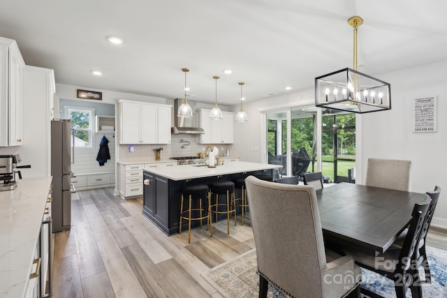 4530 Tournette Dr Unit 18, Indian Land, SC 29707 - dining space with a chandelier, recessed lighting, and light wood-type flooring