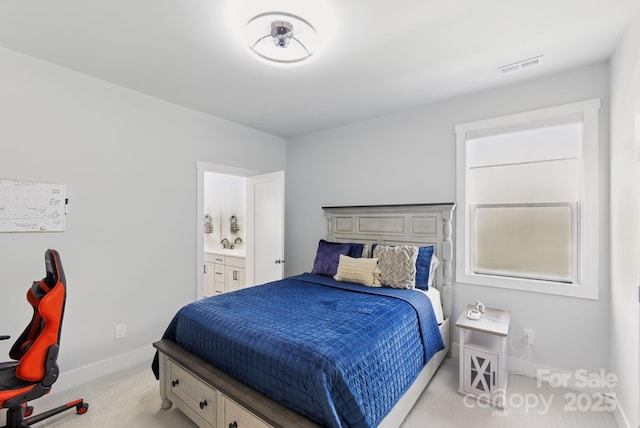 4530 Tournette Dr Unit 18, Indian Land, SC 29707 - bedroom with light carpet, baseboards, and connected bathroom