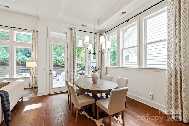 7913 Waverly Walk Ave, Charlotte, NC 28277 - dining room featuring crown molding, a chandelier, hardwood / wood-style floors, baseboards, and plenty of natural light