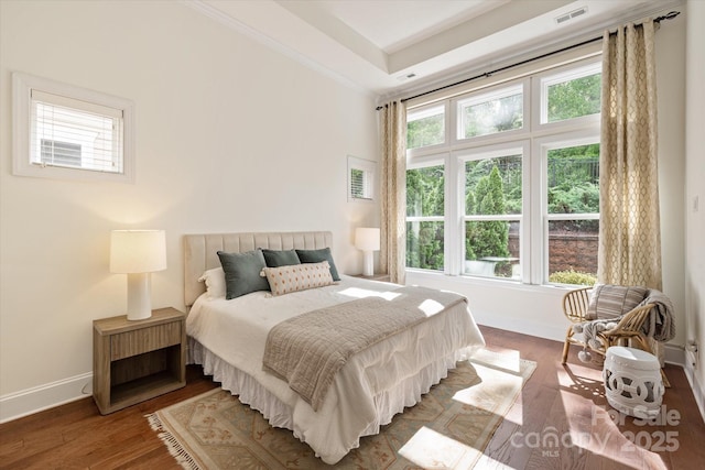 7913 Waverly Walk Ave, Charlotte, NC 28277 - bedroom featuring baseboards, wood finished floors, and ornamental molding