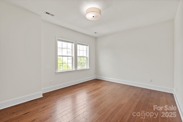 7913 Waverly Walk Ave, Charlotte, NC 28277 - empty room featuring hardwood / wood-style floors and baseboards
