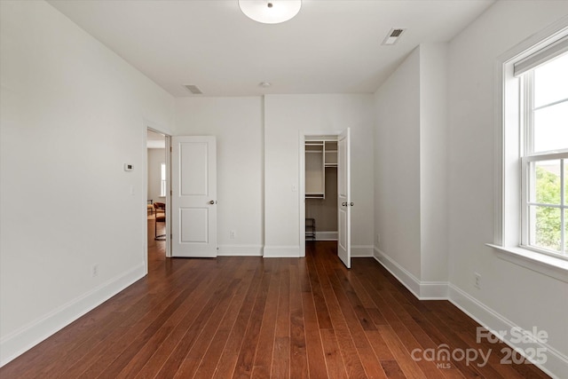 7913 Waverly Walk Ave, Charlotte, NC 28277 - unfurnished bedroom featuring baseboards and dark wood-style floors