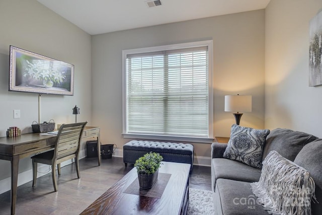 14503 Crest Ct, Charlotte, NC 28278 - living room featuring baseboards and wood finished floors