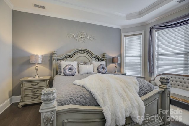 14503 Crest Ct, Charlotte, NC 28278 - bedroom featuring dark wood-style floors, ornamental molding, and a tray ceiling