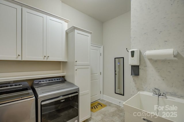 14503 Crest Ct, Charlotte, NC 28278 - washroom with cabinet space and independent washer and dryer