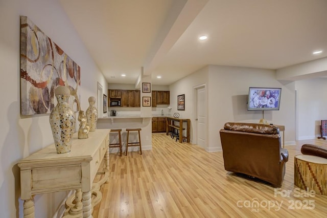 14503 Crest Ct, Charlotte, NC 28278 - living room featuring recessed lighting and light wood-style floors
