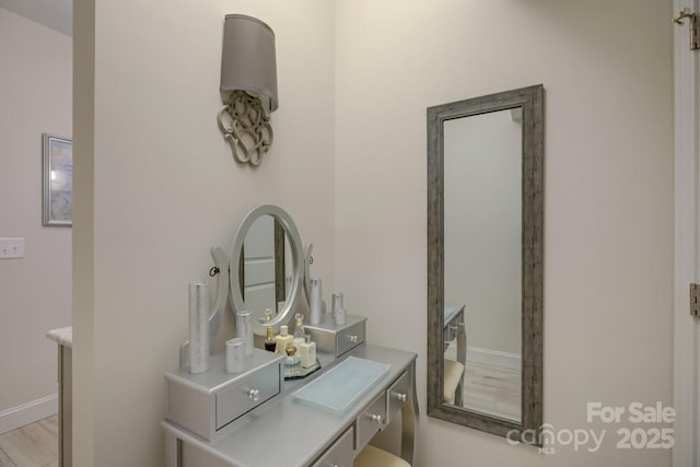 14503 Crest Ct, Charlotte, NC 28278 - bathroom view of vanity and baseboards