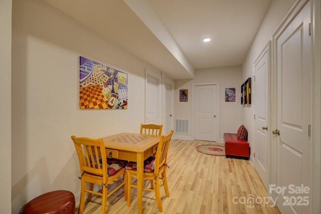 14503 Crest Ct, Charlotte, NC 28278 - dining area featuring light wood finished floors and recessed lighting
