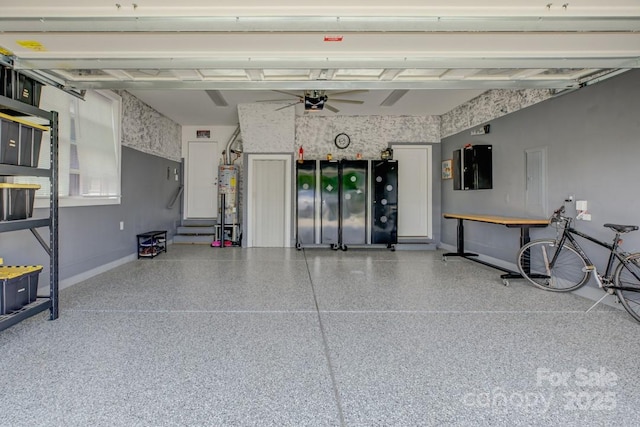 14503 Crest Ct, Charlotte, NC 28278 - garage featuring a ceiling fan, gas water heater, and a garage door opener
