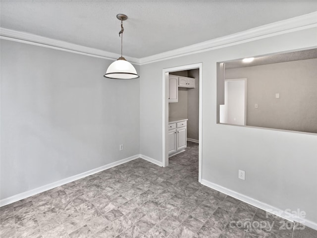 752 Raindrops Rd, Gastonia, NC 28054 - unfurnished dining area featuring ornamental molding and baseboards