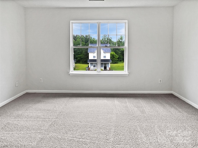 752 Raindrops Rd, Gastonia, NC 28054 - unfurnished room with baseboards and carpet flooring
