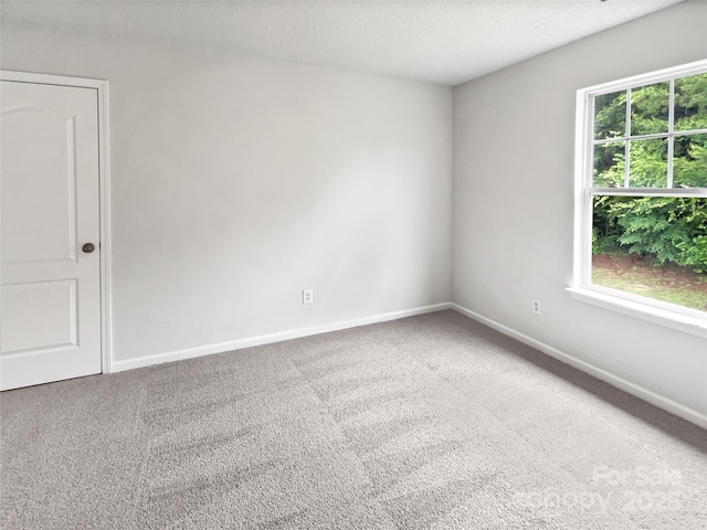 752 Raindrops Rd, Gastonia, NC 28054 - carpeted empty room featuring baseboards