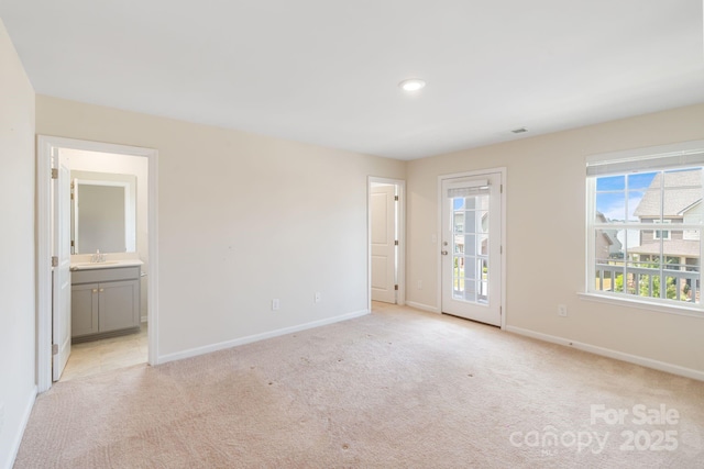 1001 Linn Cv, Waxhaw, NC 28173 - empty room with baseboards, light carpet, a sink, and recessed lighting