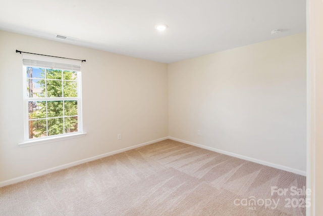 1001 Linn Cv, Waxhaw, NC 28173 - unfurnished room with light carpet, baseboards, a smoke detector, and recessed lighting