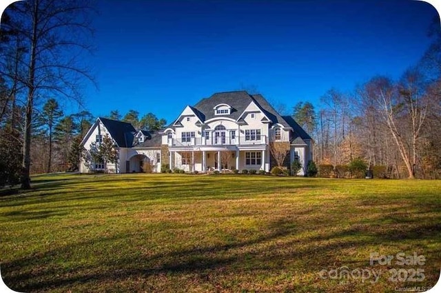 view of front of house with a front lawn and covered porch