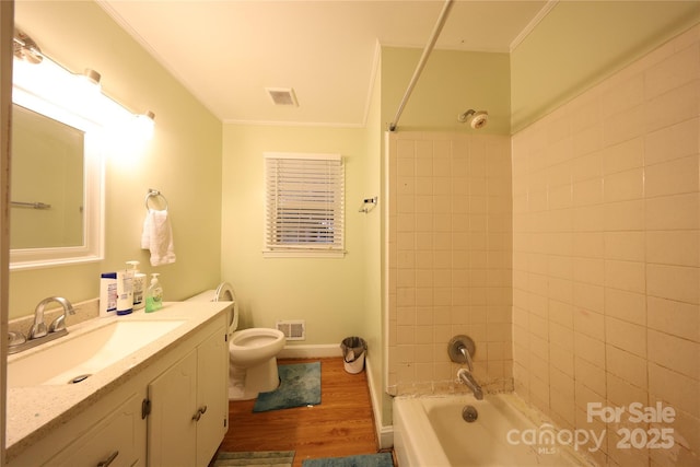 3016 Boston Ave, Charlotte, NC 28212 - bathroom featuring wood finished floors, bathtub / shower combination, ornamental molding, toilet, and vanity