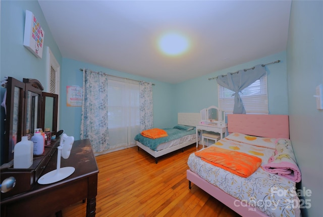 3016 Boston Ave, Charlotte, NC 28212 - bedroom with wood finished floors and a closet