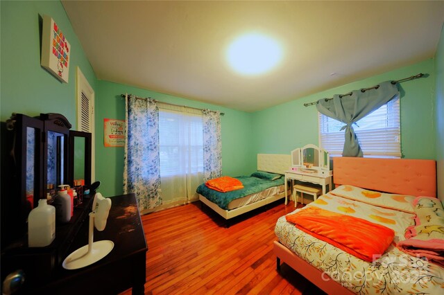 3016 Boston Ave, Charlotte, NC 28212 - bedroom featuring wood finished floors and a closet