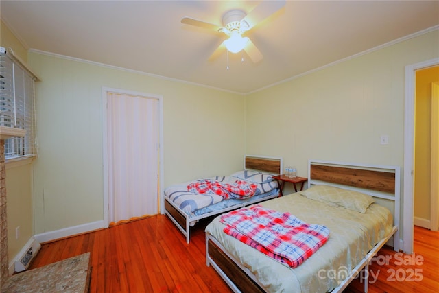 3016 Boston Ave, Charlotte, NC 28212 - bedroom with wood finished floors, ornamental molding, baseboards, and ceiling fan