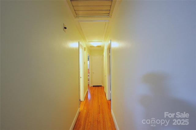3016 Boston Ave, Charlotte, NC 28212 - hallway featuring light wood-type flooring, baseboards, and attic access
