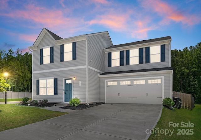 110 Browband St, Troutman, NC 28166 - view of front facade with concrete driveway and an attached garage