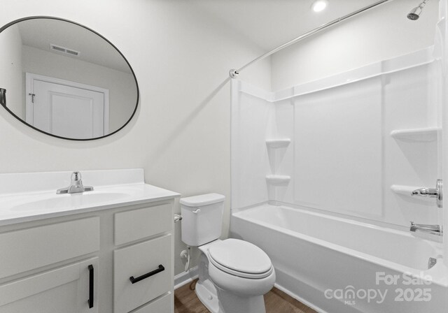 110 Browband St, Troutman, NC 28166 - full bath with wood finished floors, washtub / shower combination, toilet, and vanity